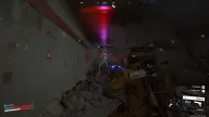 White skeleton ESP and distance labels mark raiders and ticks inside a dark rubble-strewn tunnel — Hydra Arc Raiders cheat