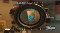 Blue chams ESP highlighting an enemy through a scope with headshot kill feed in a dormitory — Frost Pro Rainbow Six Siege cheat